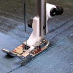 Instelbare quiltvoet 6mm met geleider rechts
