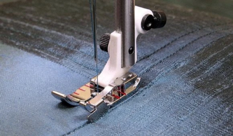 Instelbare quiltvoet 6mm met geleider rechts